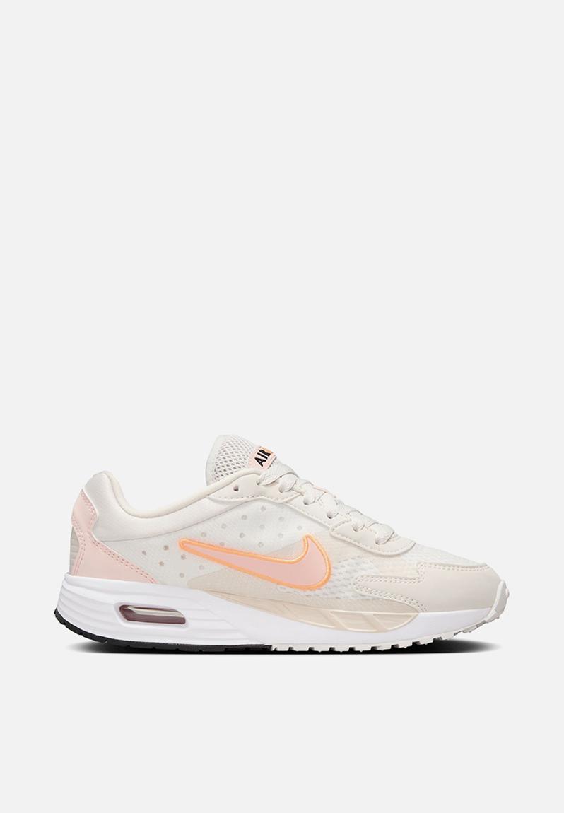 nike peach puff running shoes