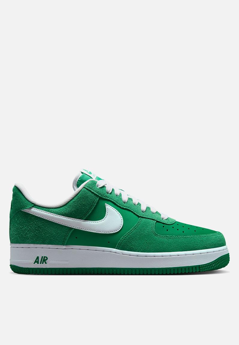 green and white low top 1s