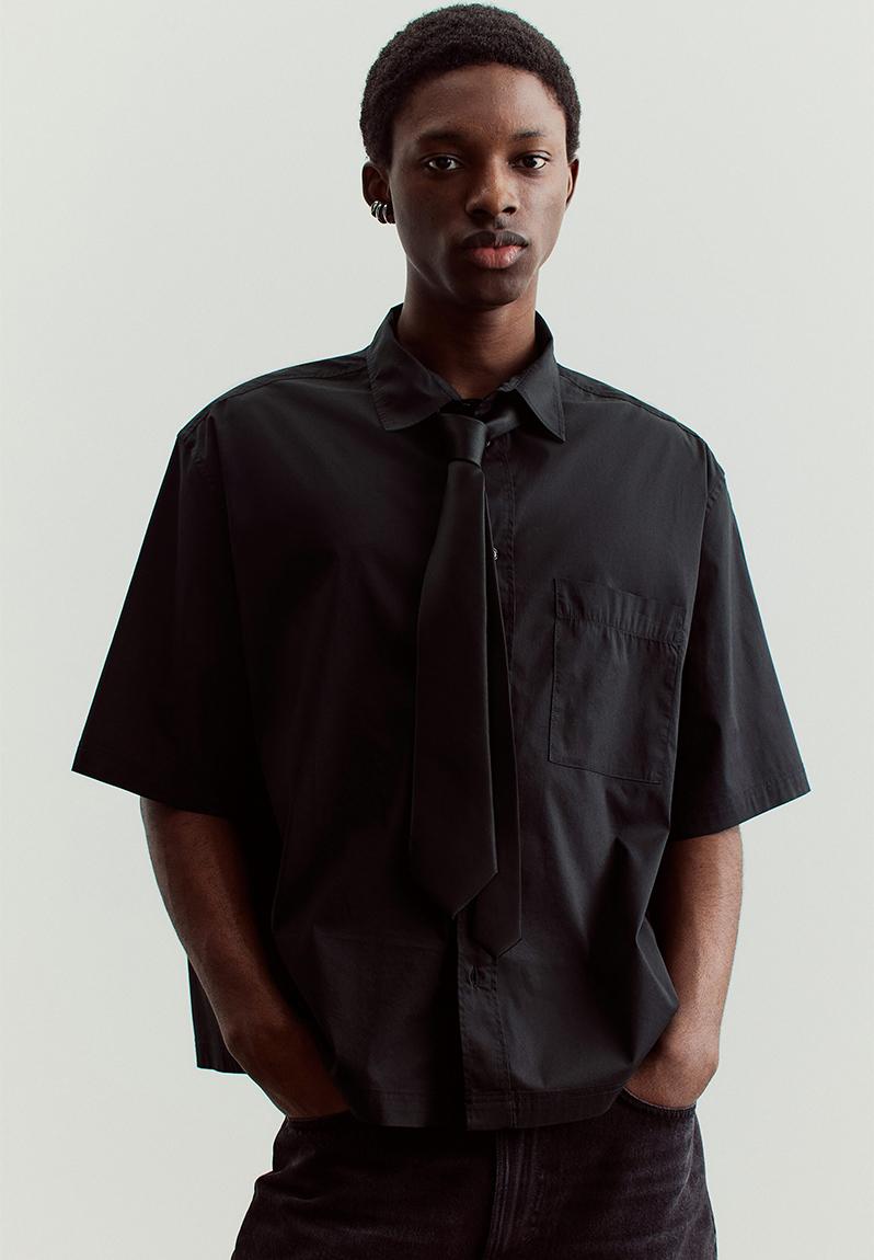Oversized fit short-sleeved shirt - black - 1277325001
