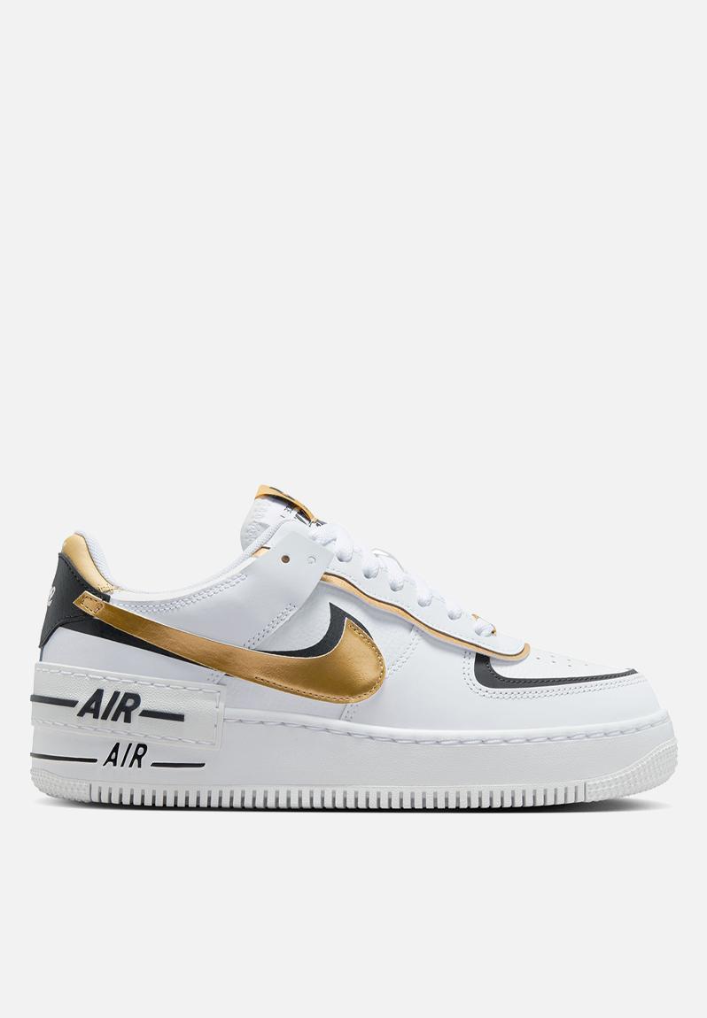 white and gold nike air