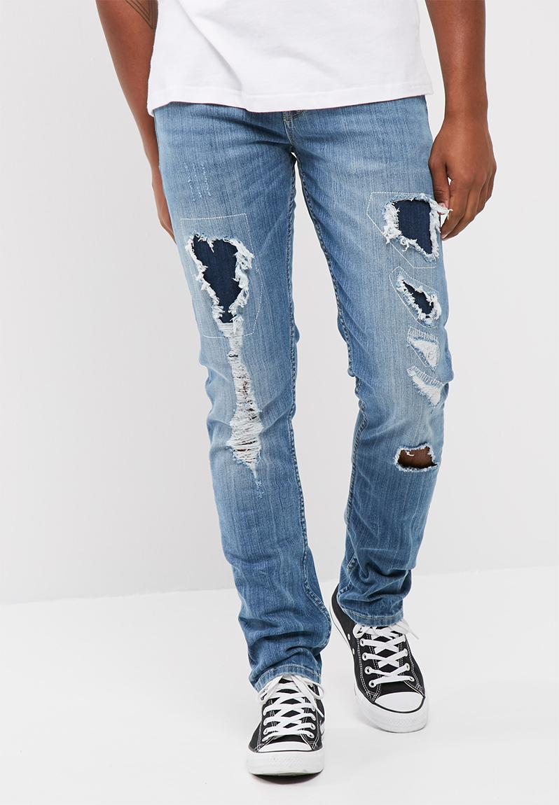 Slim tapered denim-charger blue wash with destroy GUESS Jeans ...