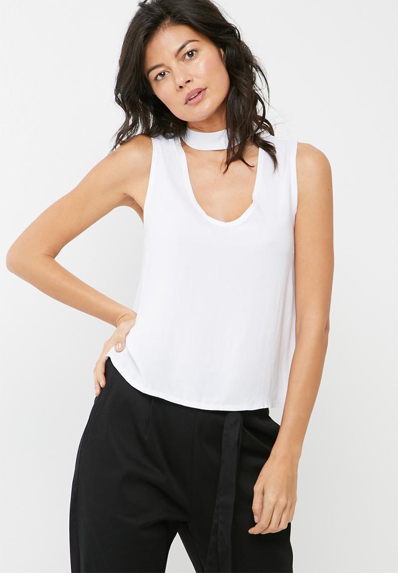 sleeveless white blouse with collar