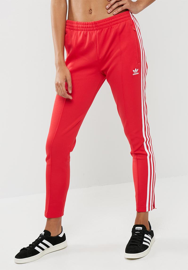 SST track pant - radiant red adidas Originals Bottoms | Superbalist.com