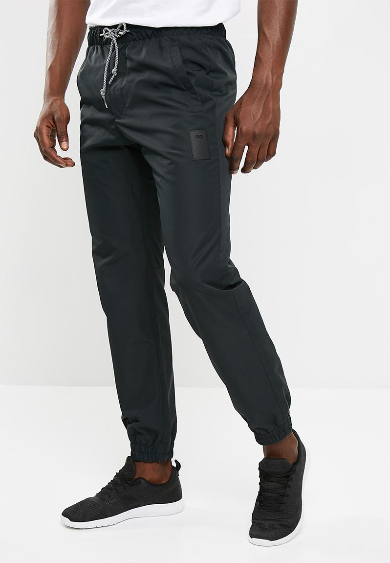 Track pants- black ASICS Sweatpants & Shorts | Superbalist.com