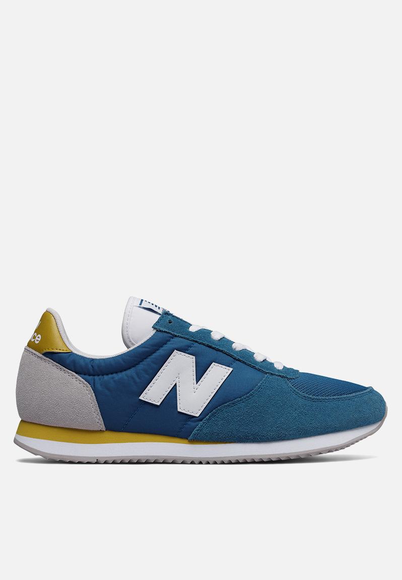 U220DC - Blue New Balance Sneakers | Superbalist.com