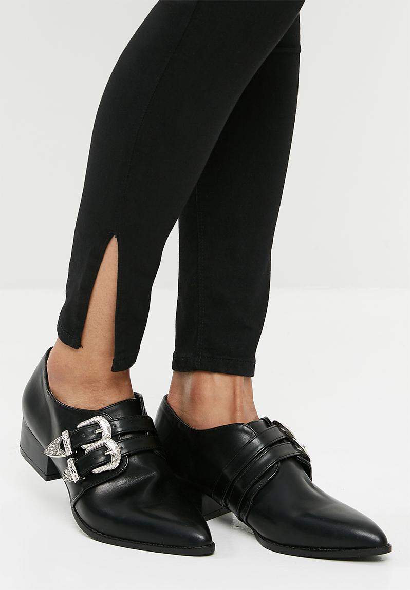 pointed toe buckle flats