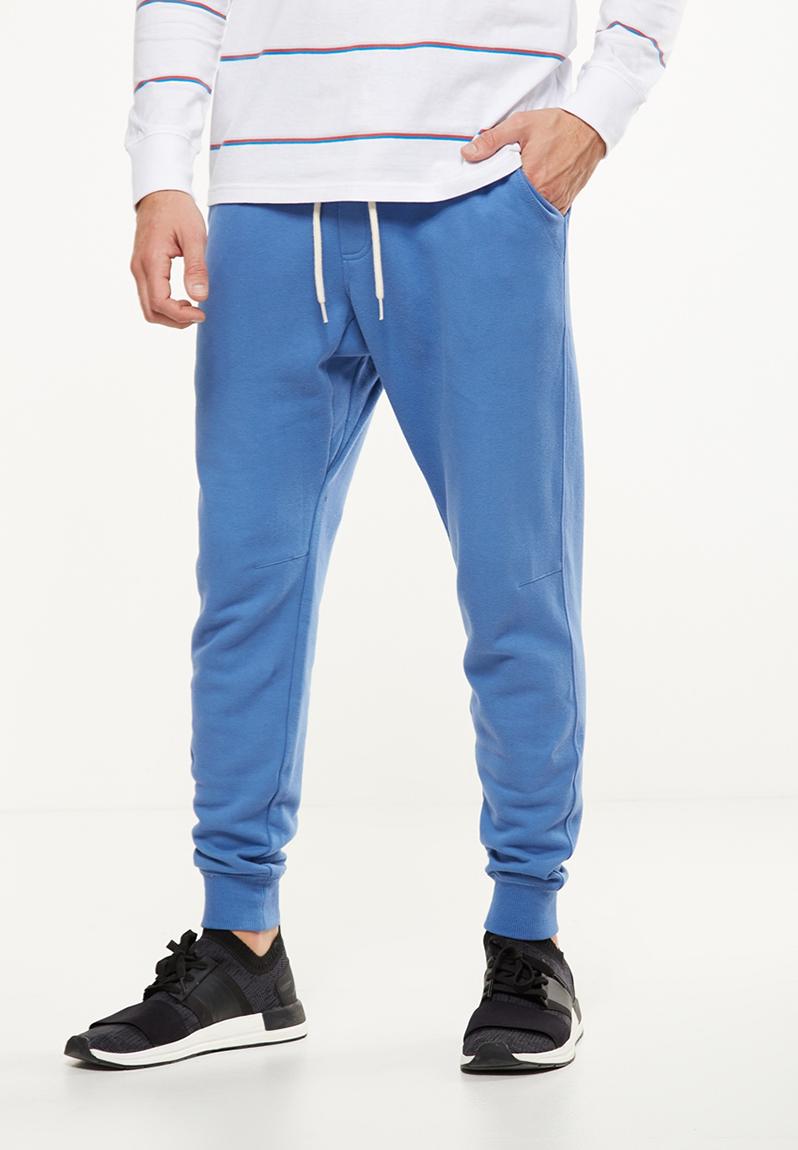 Trippy Slim Fit Trackie - riviera blue Cotton On Pants & Chinos ...