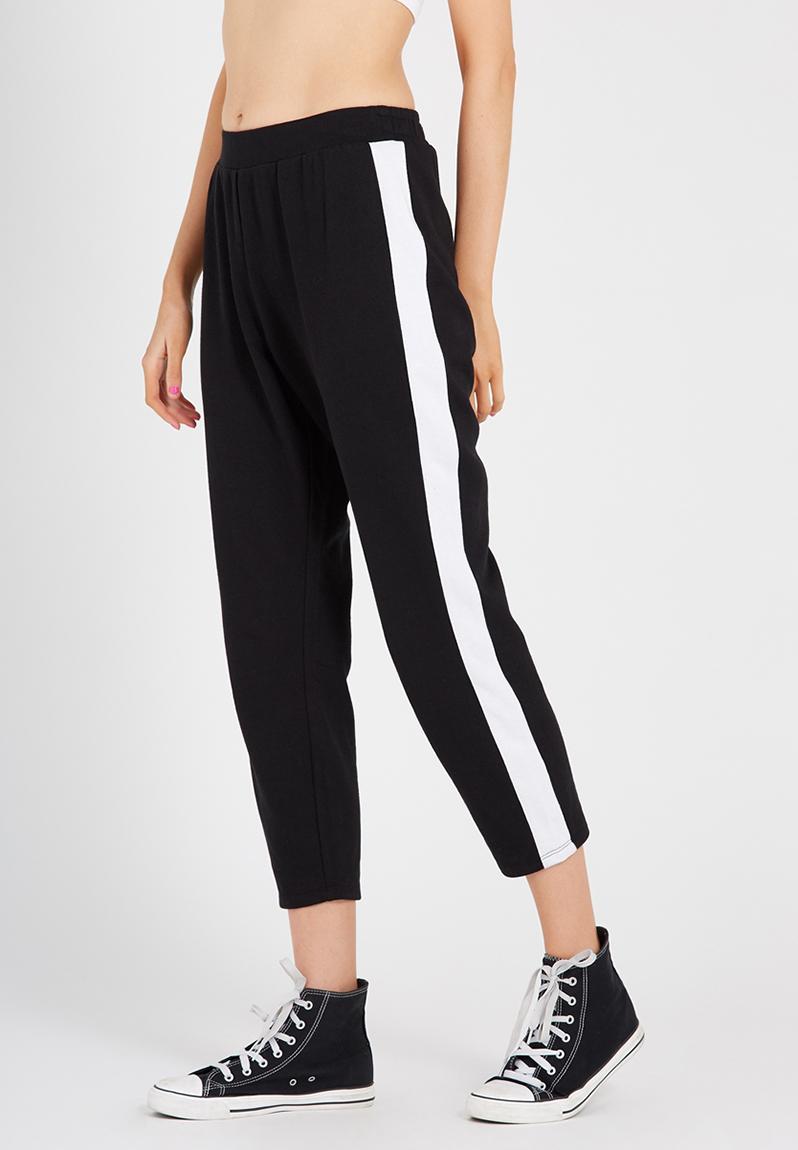 white stripe black trousers