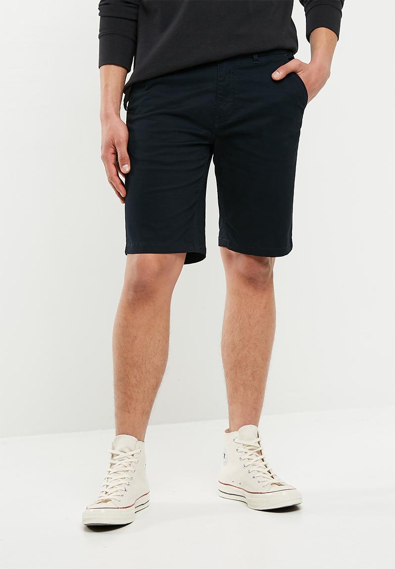 next slim chino shorts