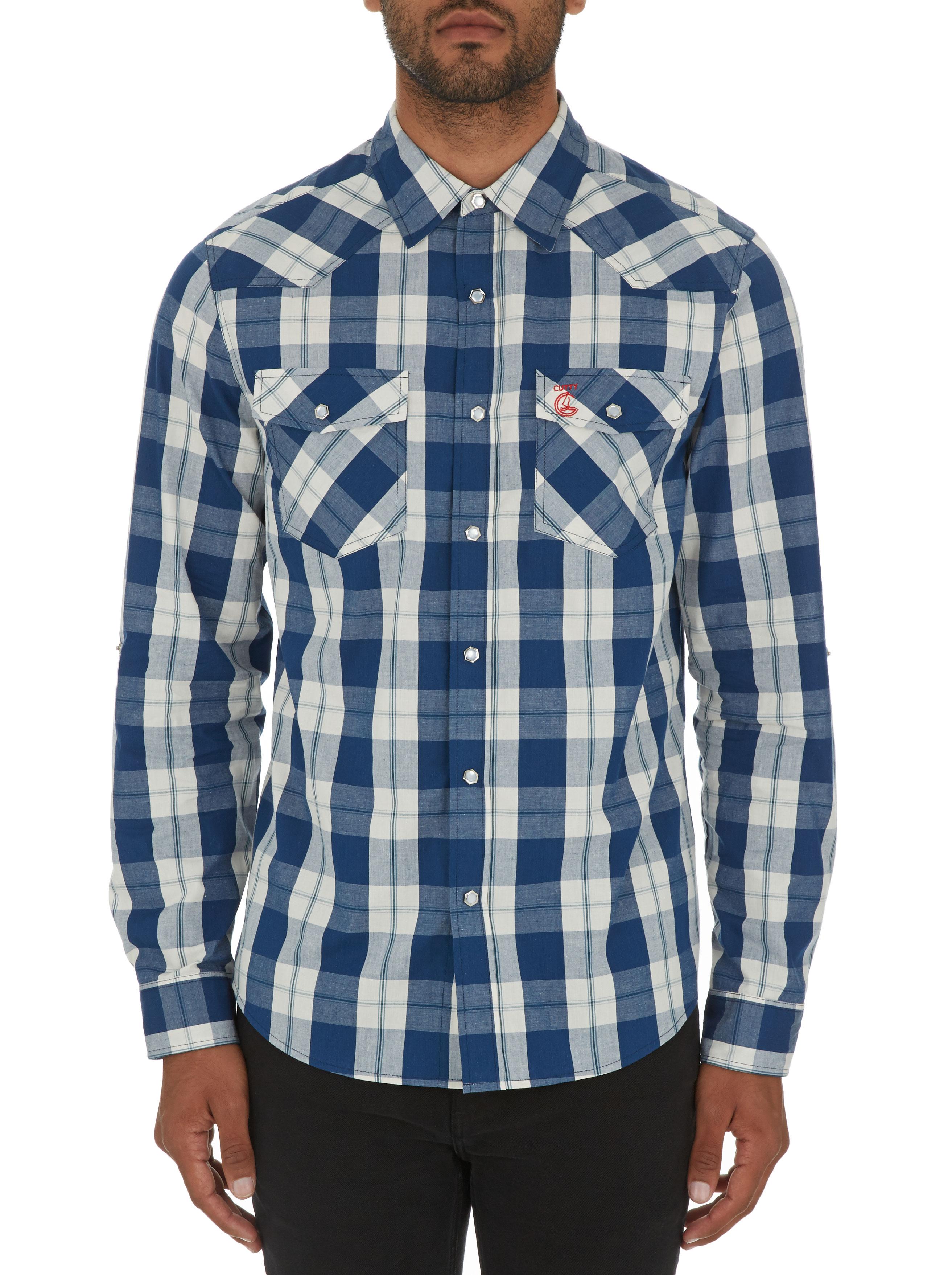 blue check shirt with black pants