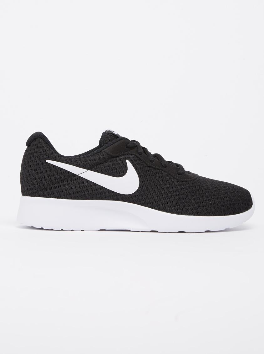 black nike tanjun sneakers