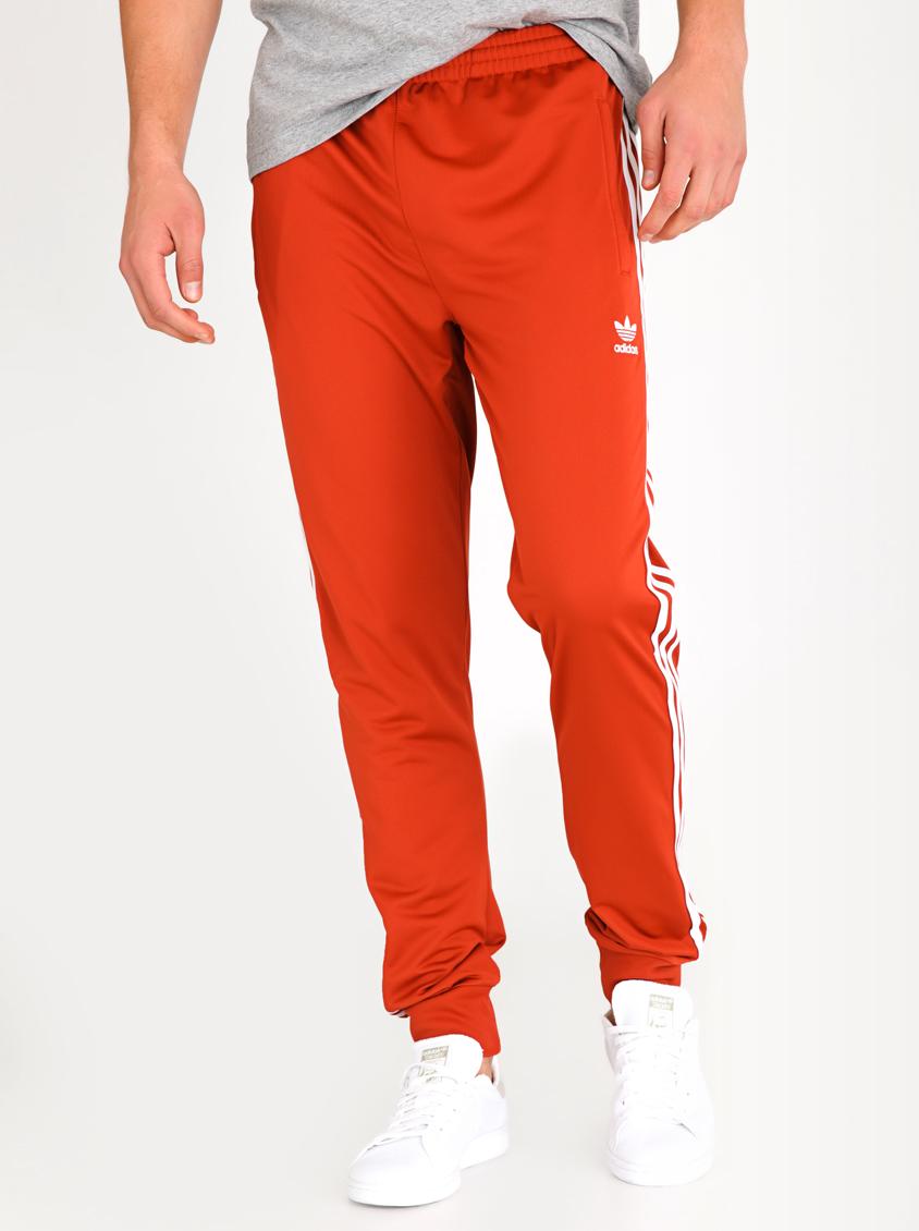 SST Track pant - shift orange/white adidas Originals Sweatpants ...