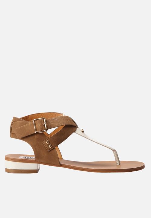 white and tan sandals